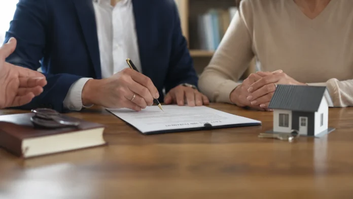 Estate planning documents beside a model house and keys, representing blended family inheritance and trust tax risks in Australia.