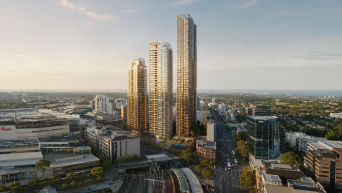 A premium aerial-style view of Bondi Junction with proposed high-rise apartment towers rising above Oxford Street, transport links and surrounding eastern suburbs skyline. 