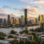 Brisbane skyline and river viewed from an elevated position, used to illustrate a cooling but still resilient Brisbane property market.