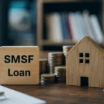 Wooden SMSF loan block beside a model house, coin stacks and financial documents, illustrating the debate over SMSF borrowing and property investment rule